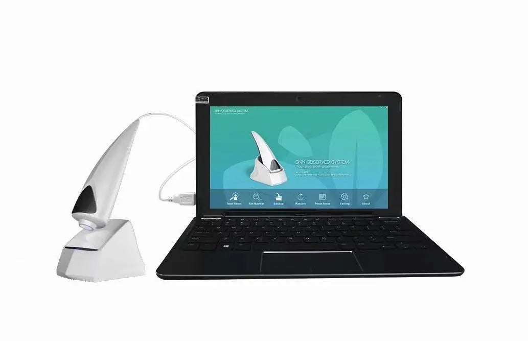 Black laptop with a screen displaying software interface, accompanied by a white camera on a white background.