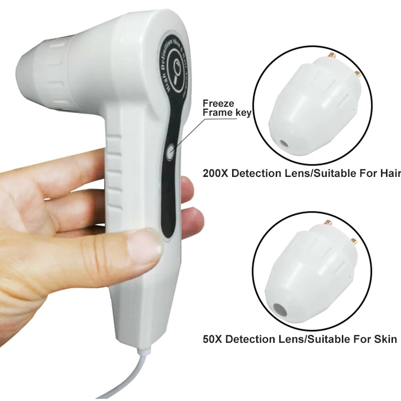 Handheld device with freeze frame key and detection lenses, held by a hand.