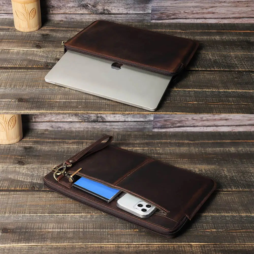Brown leather wallet with phone and card holder on a wooden surface