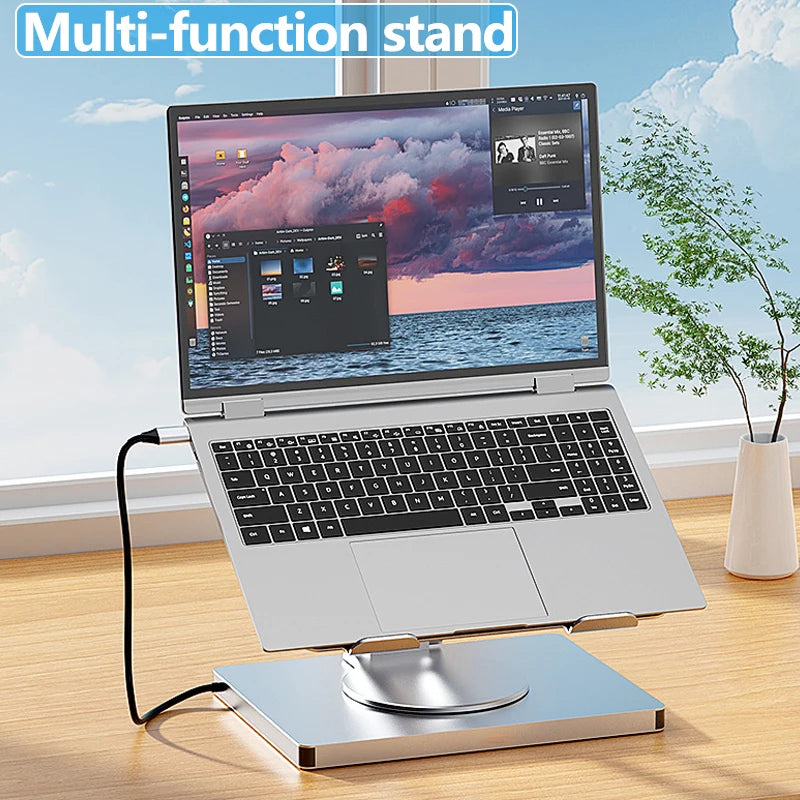 Laptop on a multi-function stand with a scenic view in the background