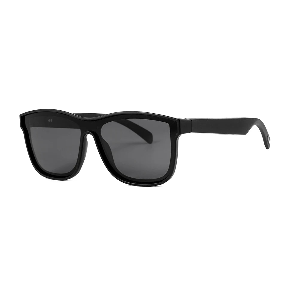 Black sunglasses with dark lenses on a white background