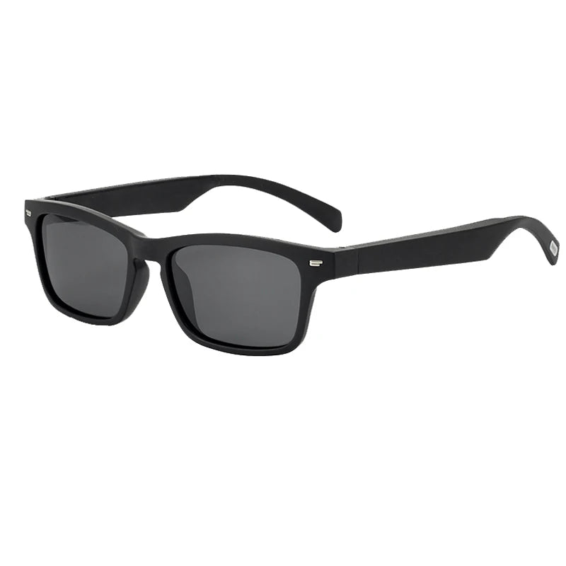 Black sunglasses with dark lenses on a white background