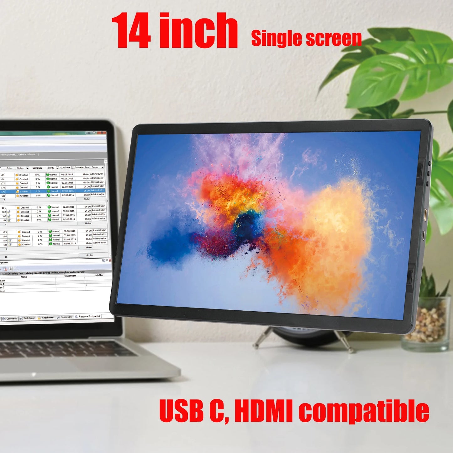 14-inch single screen monitor with colorful display on a desk, next to a laptop.