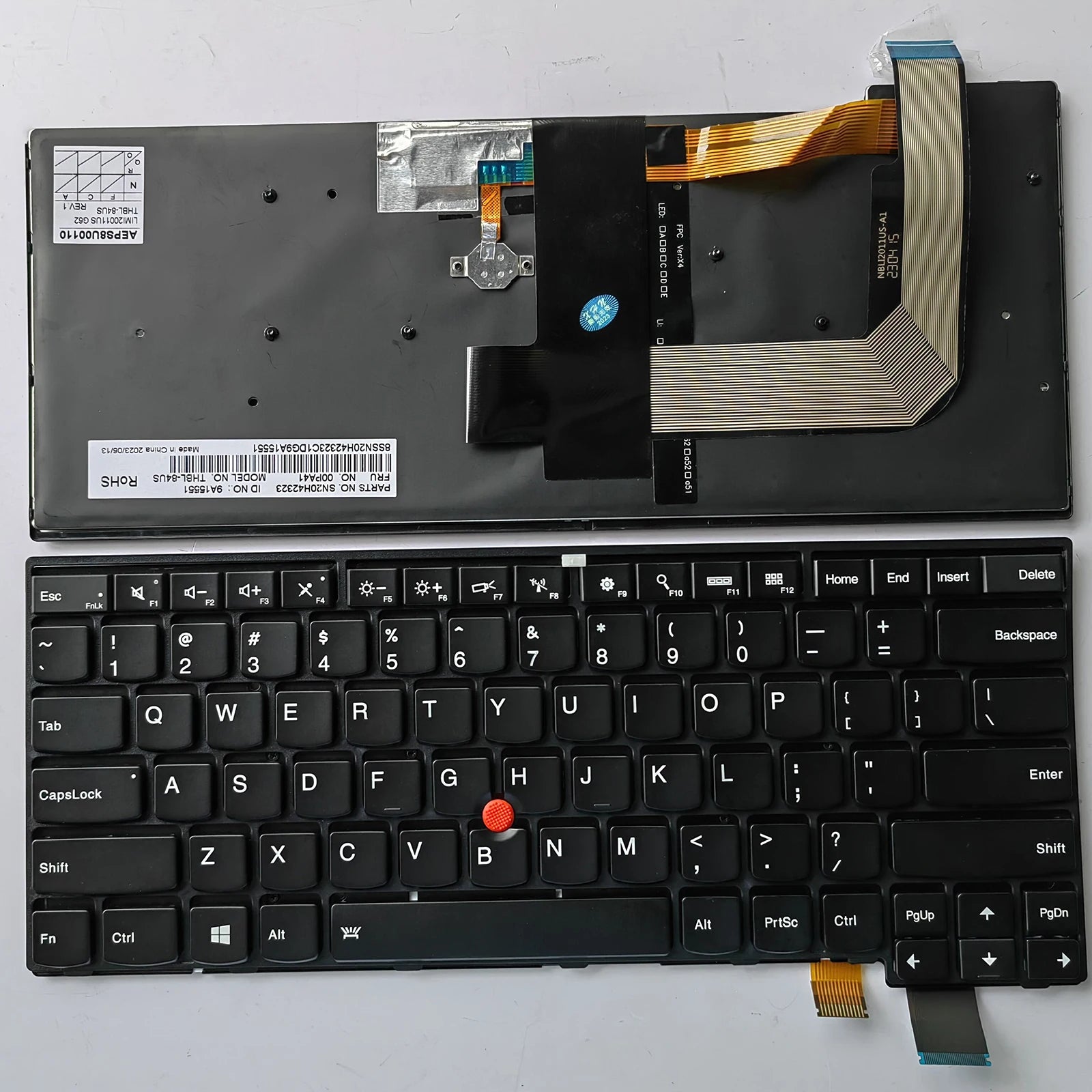 Laptop keyboard with screen removed on a white background