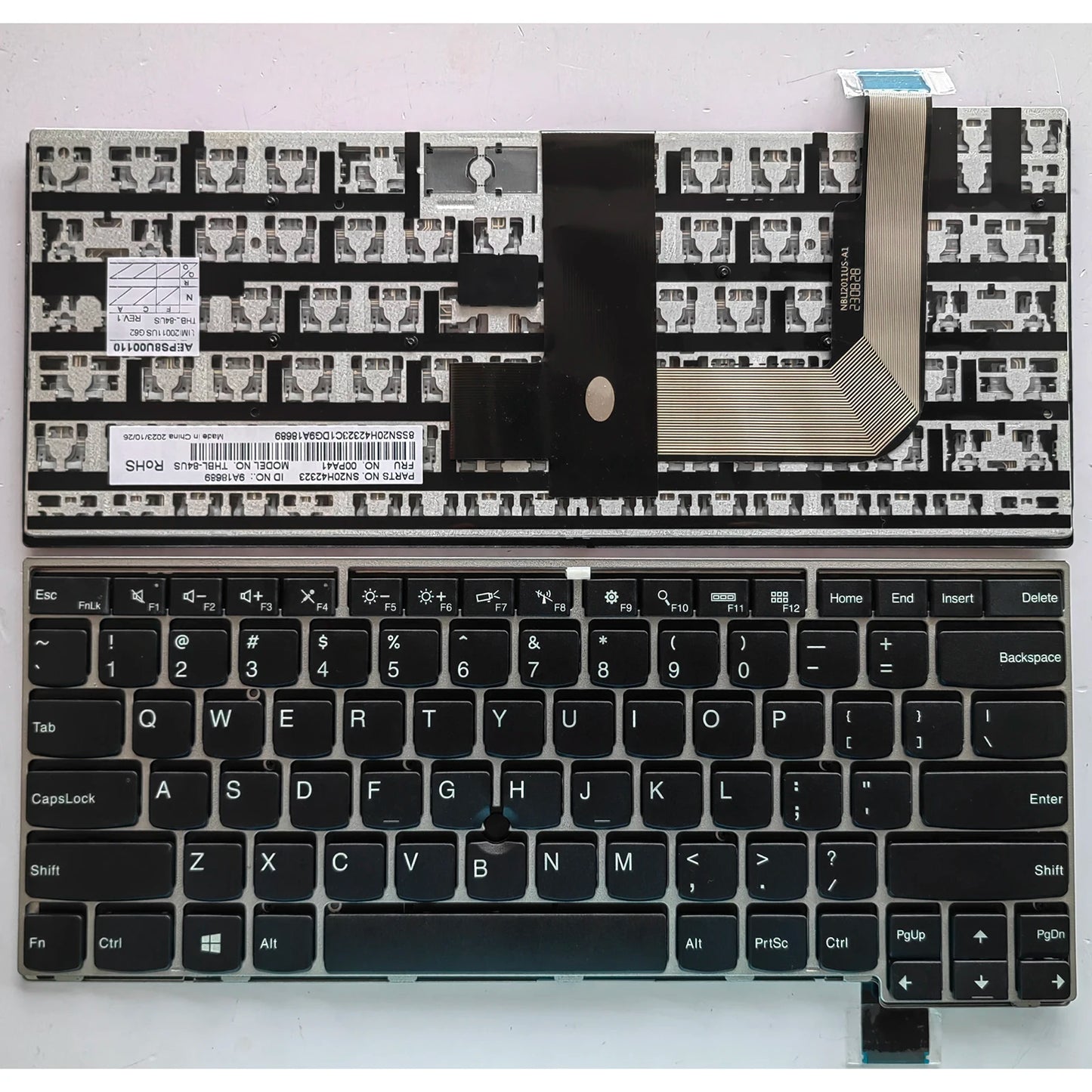 Laptop keyboard with a unique black and white pattern on the back