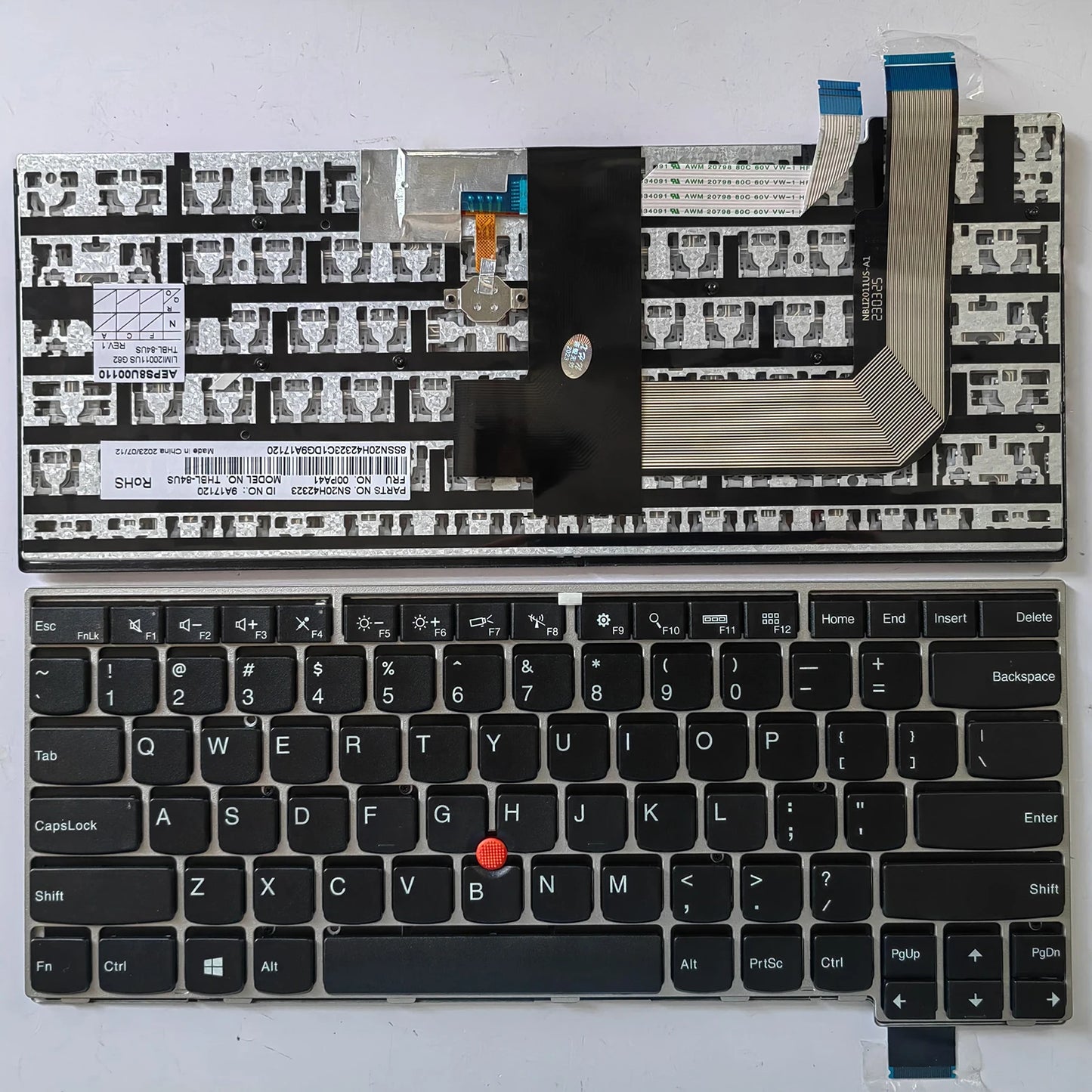Laptop keyboard with visible branding on a white background